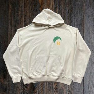 Rhude Cream Hoodie with Green and Gold Accents